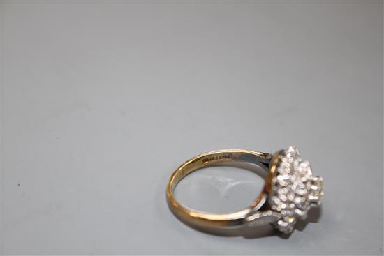A 1960s 18ct gold and illusion set diamond cluster ring,